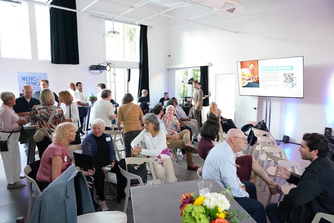 Founders, investors, and community members networking at AgeInnovate 2025 in Nashville